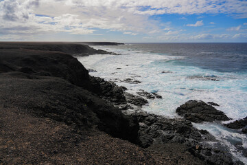 Sea cliffs of the Jandia Natural Park as seen from Punta Pesebre (