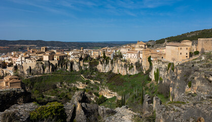 Fototapeta na wymiar Scenic view of ancient Spanish city of Cuenca, located in mountains on rocky ledge on spring day..