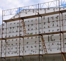 Insulation of the external walls of the house with foam