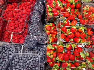 buying fruits and  berries ( raspberries, blueberries, blueberries, strawberries, gooseberries)at...