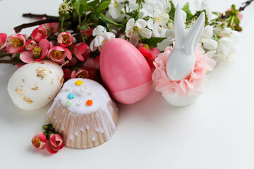 Easter card design. spring flowers, easter eggs and easter bunny