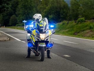 Police motorcycle rider on the road