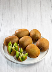 Fresh Kiwi fruit on the table.