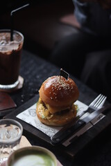 Close up a cup of Matcha green tea Latte art hot drink on wooden table background