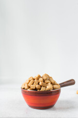 Nigerian Chin chin in an enamel bowl, Fried chin-chin snack in an enamel bowl, Nigerian party food...