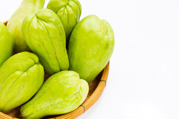 Fresh chayote fruit on white background.