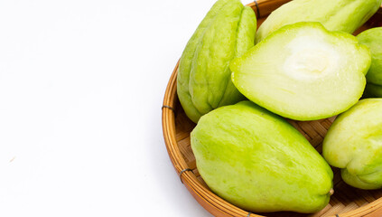 Fresh chayote fruit on white background.