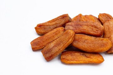 Sun dried bananas on white background.