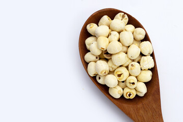 Dried lotus seeds on white background.