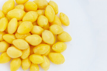 Boiled ginkgo nuts on white background.