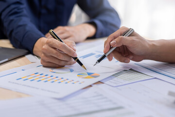 Business people Consulting meeting working graphs and charts to account analyze market data and brainstorming new business project finance investment concept.