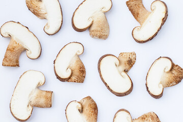Fresh shiitake mushrooms on white