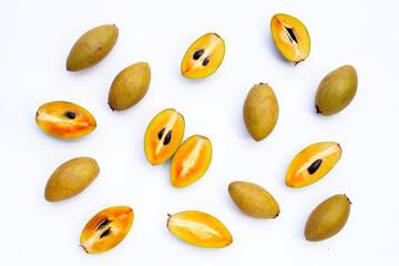 Fresh sapodilla fruit on white background