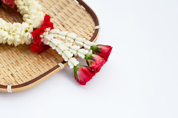 Jasmine garland with rose flower on white background.