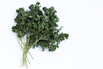 Dried parsley on white background.
