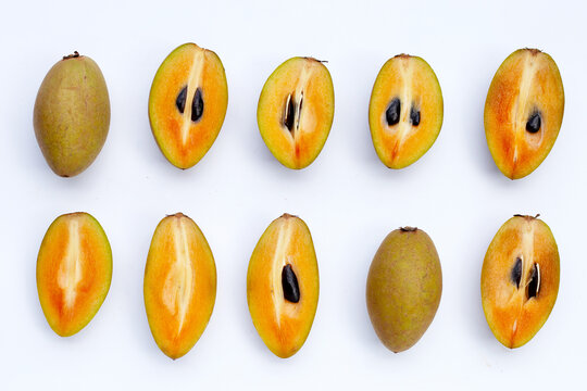 Fresh sapodilla fruit on white background