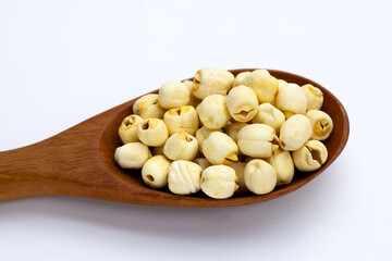 Dried lotus seeds on white background.