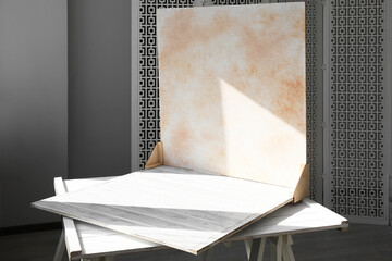 Double-sided backdrop on table in photo studio