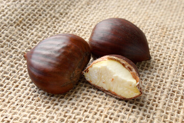 Fresh Portuguese chestnut on table