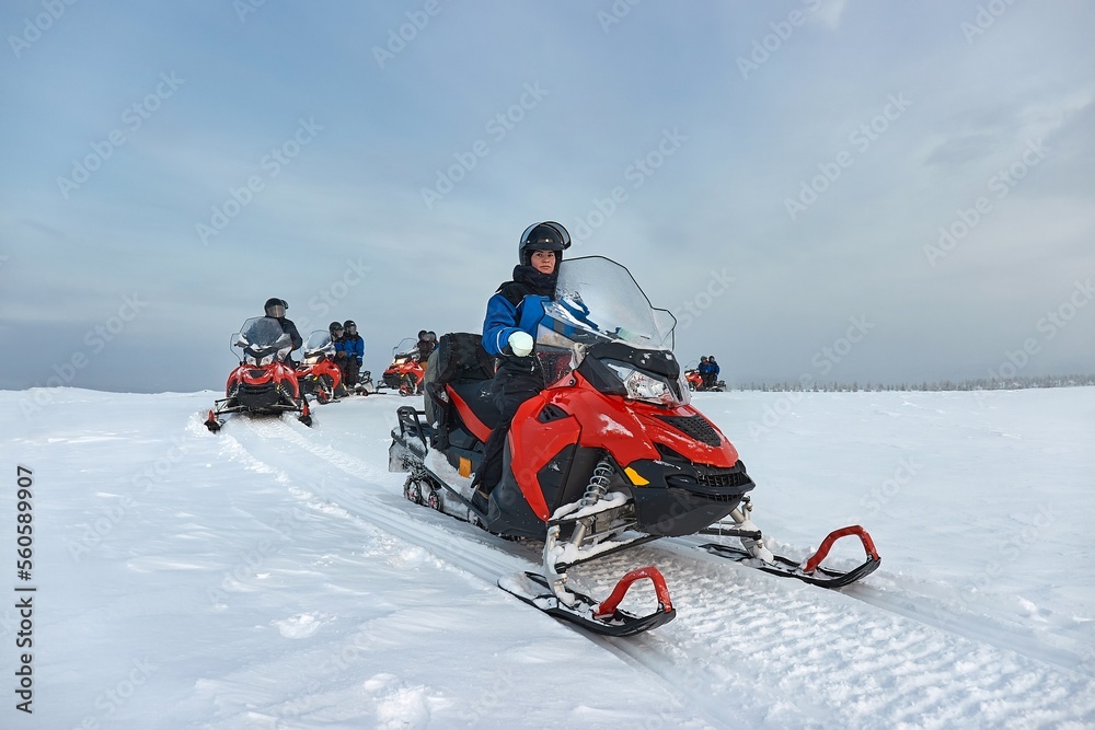 Wall mural snow mobile trip in lapland