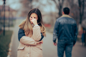 Sad Upset Woman Crying After a Painful Break-up. Man leaving his girlfriend after bad split-up last...