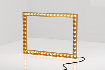 3d retro gold signboard with glowing yellow light bulb . Concept of billboard design for cinema, casino, marquee or nightclub . 3d high quality render