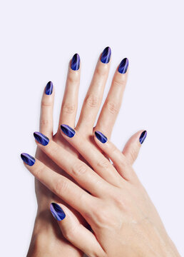 Blue Beautiful Manicure On White Background