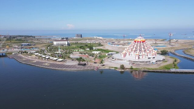 Aerial view of Masjid 99 Kubah (99 Domes Mosque) and its surrounding, a beautiful Mosque with unique architecture, located in famous destination, Losari Beach, Makassar, South Sulawesi, Indonesia. 