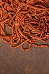 A pile of Earth Tone color Beads for background