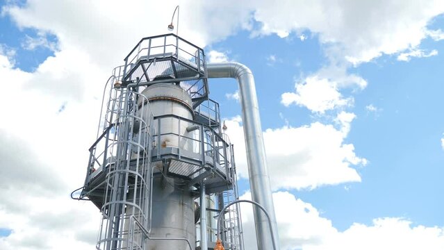Refinery chemical factory. Modern equipment, steel tanks and boilers with cables, pipelines and valves for chemical mixing. Production of anti-turbulent additives used in oil industry. 4 k video