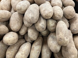 Pile of Russet Potatoes at a grocery store