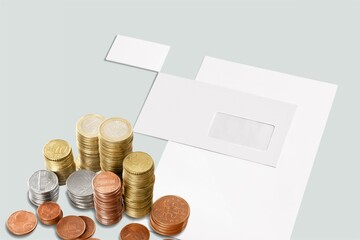 Stack of coins on the envelope, business concept