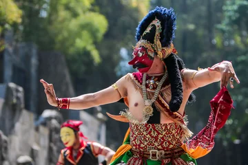 Fototapete Karneval Traditional Javanese dancer practicing a mask dance with complete costume set