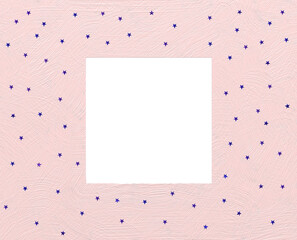 Light pink painted frame overlay with ultramarine glitter tiny stars and square opening negative copy space for overlaid objects, social media postings, cards, emails and wide range of projects.