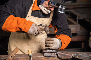 Fototapeta premium Work in a mechanical workshop with various tools