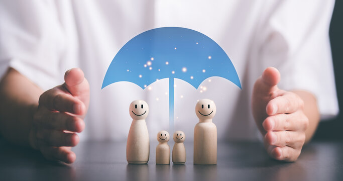 wooden dolls and icons represents the protection and protection of safety,concept of insurance management planning To ensure both health and financial safety,Property and Family Risk Reduction
