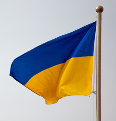 Flag of Ukraine against the sky.