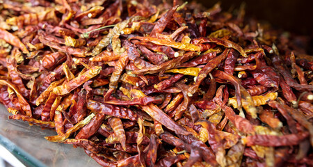 Dried hot chili peppers as a background.