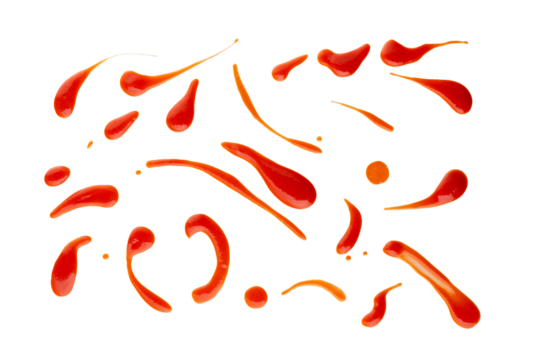 Set of red drops and splashes of ketchup or sauce isolated on white background. With clipping path. Full depth of field. Focus stacking