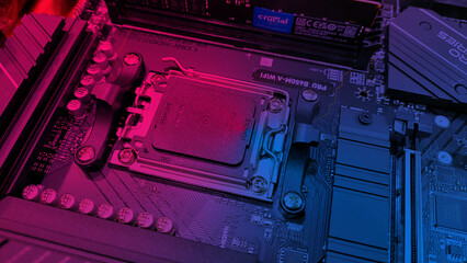 Turkey, Istanbul - December 21, 2022 Process of installing AMD Ryzen 7 7700 processor on the motherboard, close-up