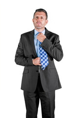 businessman in grey suit tying the necktie isolated over white background