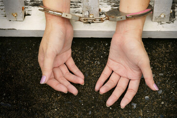 hands in jail