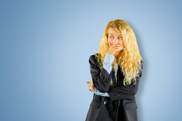 Businesswoman restricting disgusted looking