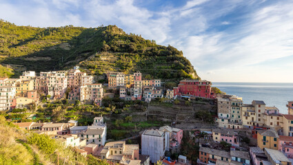 Fototapeta na wymiar Small touristic town on the coast, Manarola, Italy. Cinque Terre. Sunny Fall Season day.