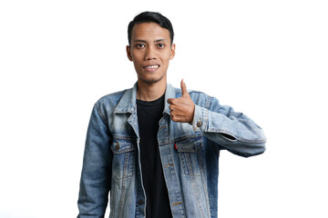 asian man wearing blue jean jacket showing thumbs up, isolated on white background