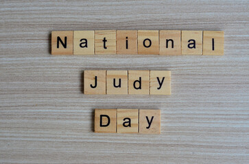 National Judy day text on wooden square, holiday concept quotes