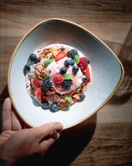 Granola Muesli, coconut, yoghurt, fresh berries, food styling cafe
