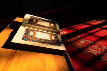 Islamic background photo. First pages of Quran in the mosque