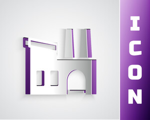 Paper cut Factory icon isolated on grey background. Industrial building. Paper art style. Vector