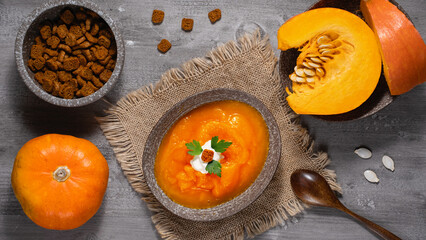 Pumpkin soup puree with croutons and dill